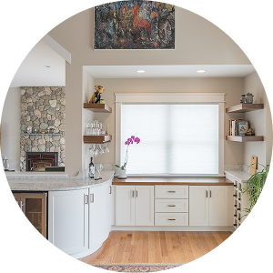 Whole-home remodeling including kitchen, living room, and bar area by California HarborCrest Kitchen Design